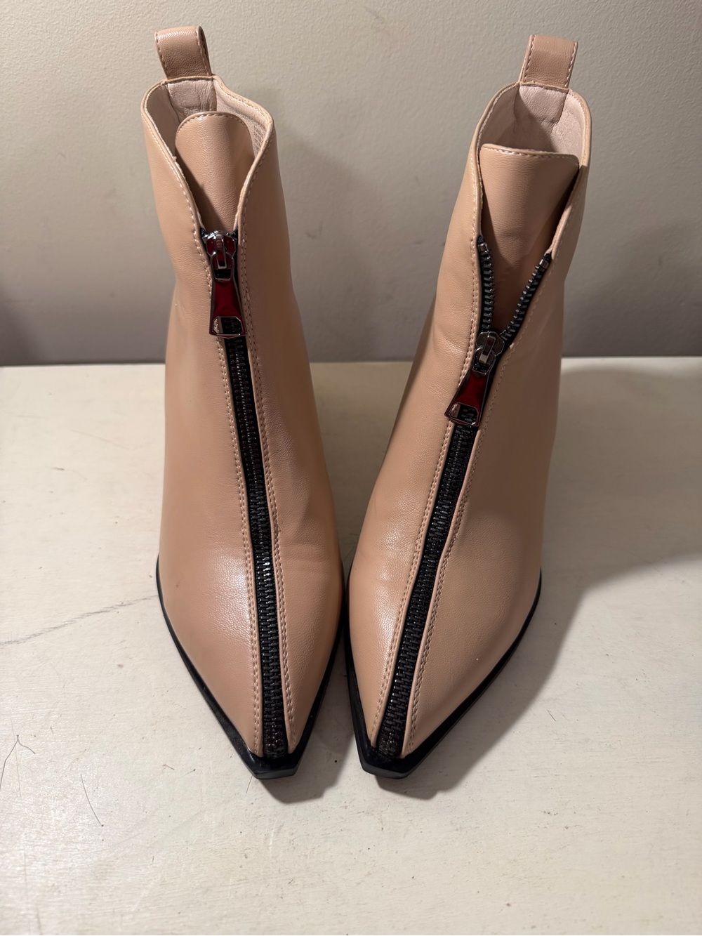 Women's Nude Pointed-Toe Front-Zip Ankle Booties